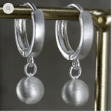 DANSK - Silver ball huggie earring
